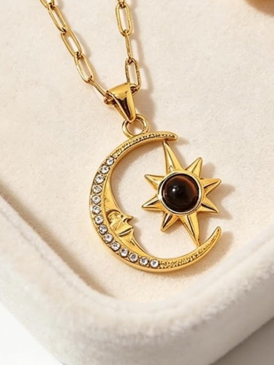 Anthropologie Jewelry - Anthropologie Gold Moon & Sun Pendant Necklace with Black Center